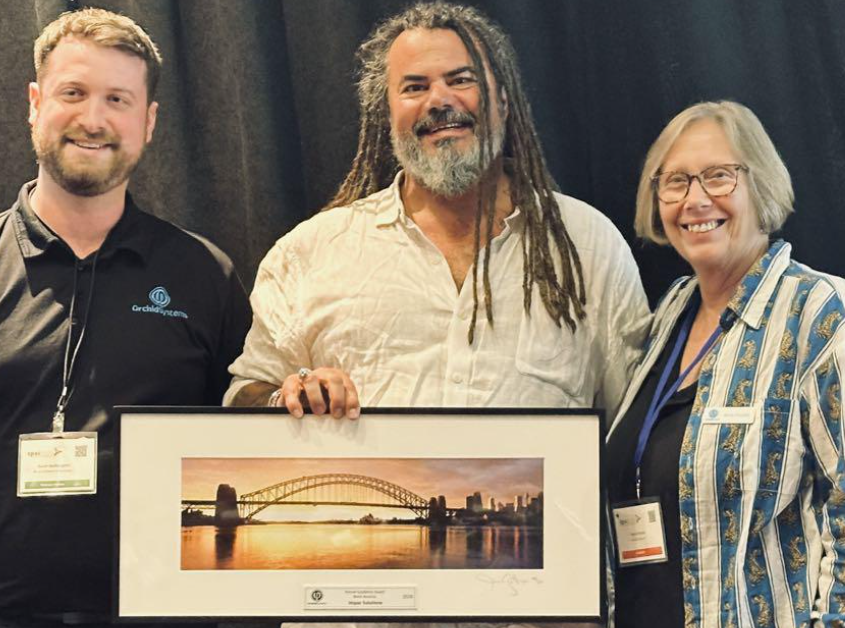 Impac Solutions receiving their award